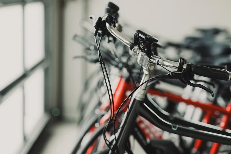 a close up of many bikes in a room